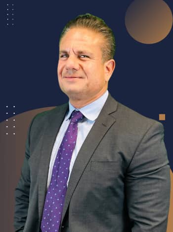 Michael Manolakis lead trial attorney Liga De Justicia Injury Lawyers